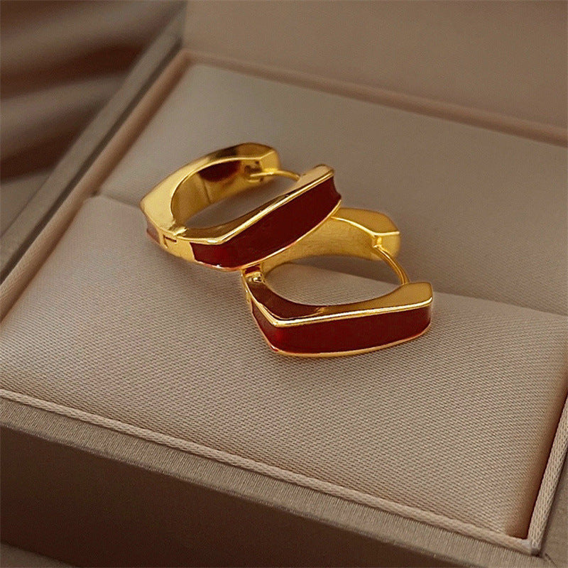 Boucles d’oreilles géométriques carrées simples et raffinées