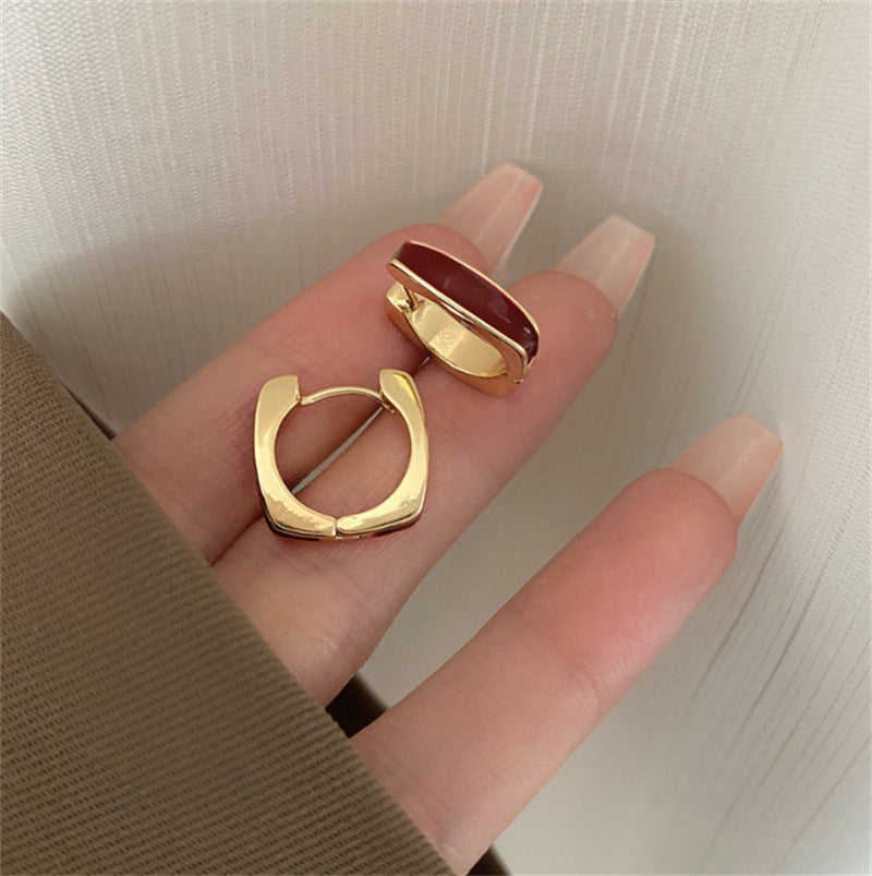 Boucles d’oreilles géométriques carrées simples et raffinées