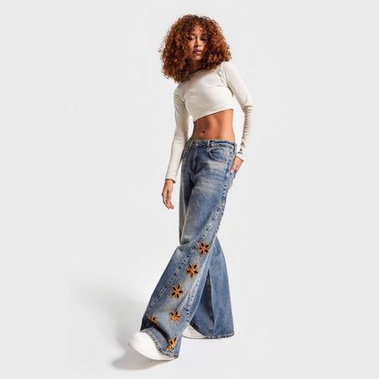 Pantalon large brodé à motifs floraux