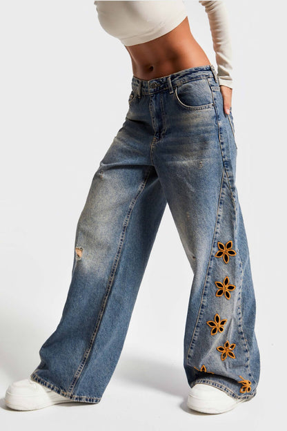 Pantalon large brodé à motifs floraux
